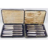 A set of six silver handled fruit knives, Sheffield 1927, housed in fitted case, and a set of six