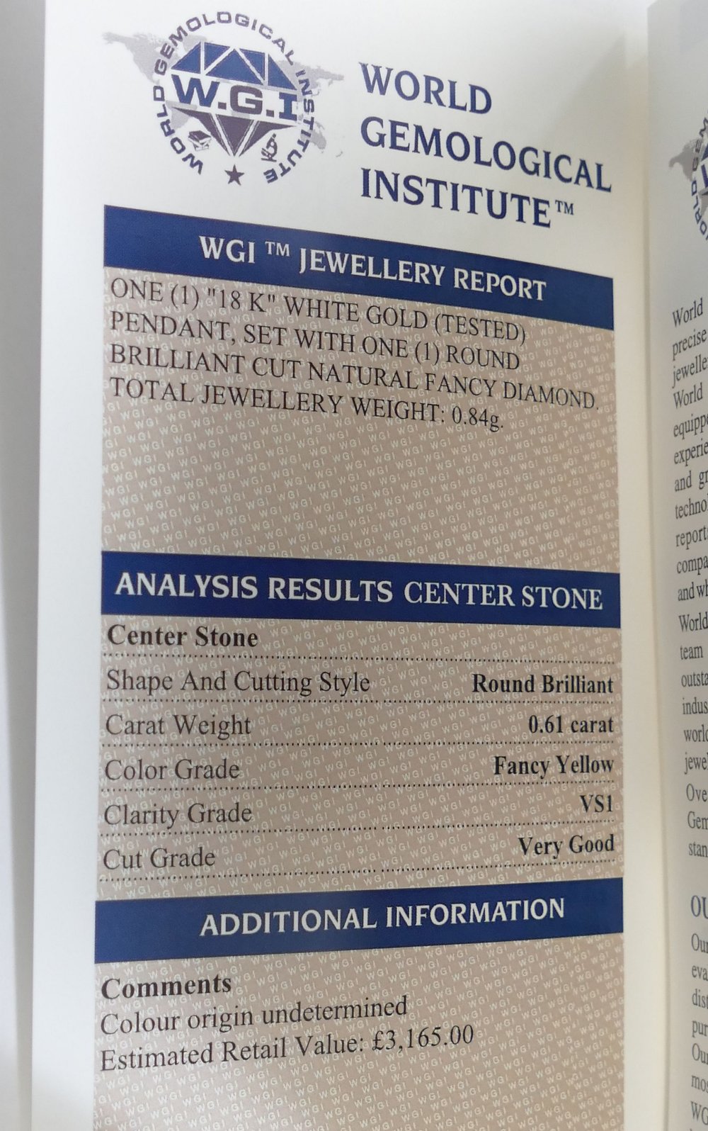 A fancy yellow diamond pendant, the round brilliant cut stone 0.61 carats, VSI clarity, housed in - Image 4 of 5