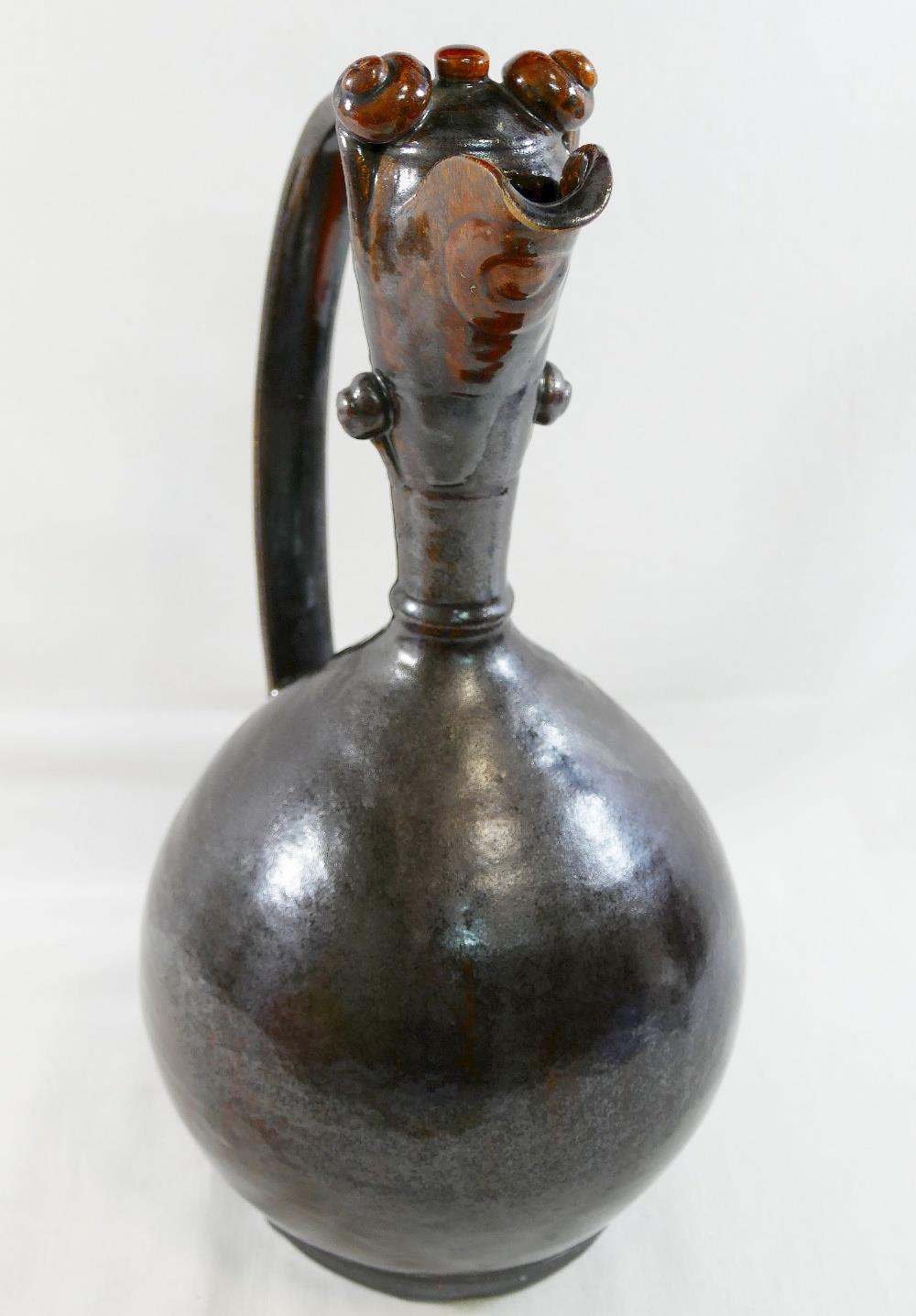 A Turkish Canakkale pottery brown glazed ewer, 32cm high, and another Turkish pottery yellow and - Image 3 of 3