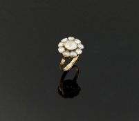 A 19th century rose-cut diamond daisy-head cluster ring, the rose cut stones in foil back setting,