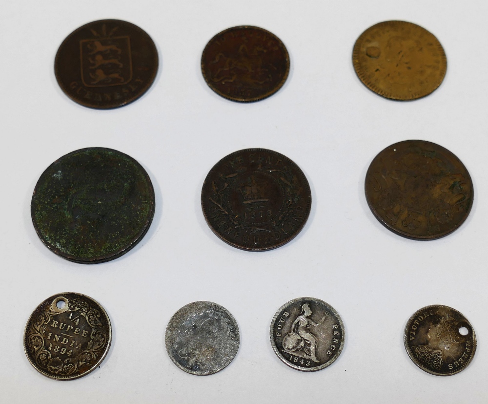 A collection of British and Colonial coins and tokens comprised of 11 George VI 1938 and 1939 West
