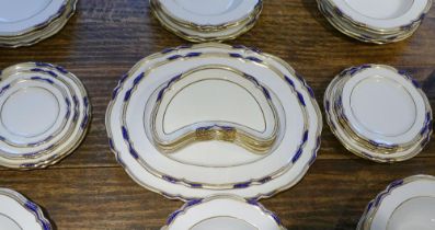 A Spode Copeland dinner service, pattern number 9688 in cobalt blue and gilt, an early variation