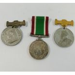 A WWII Women's Voluntary Service medal with ribbon, five London School Board medals awarded for