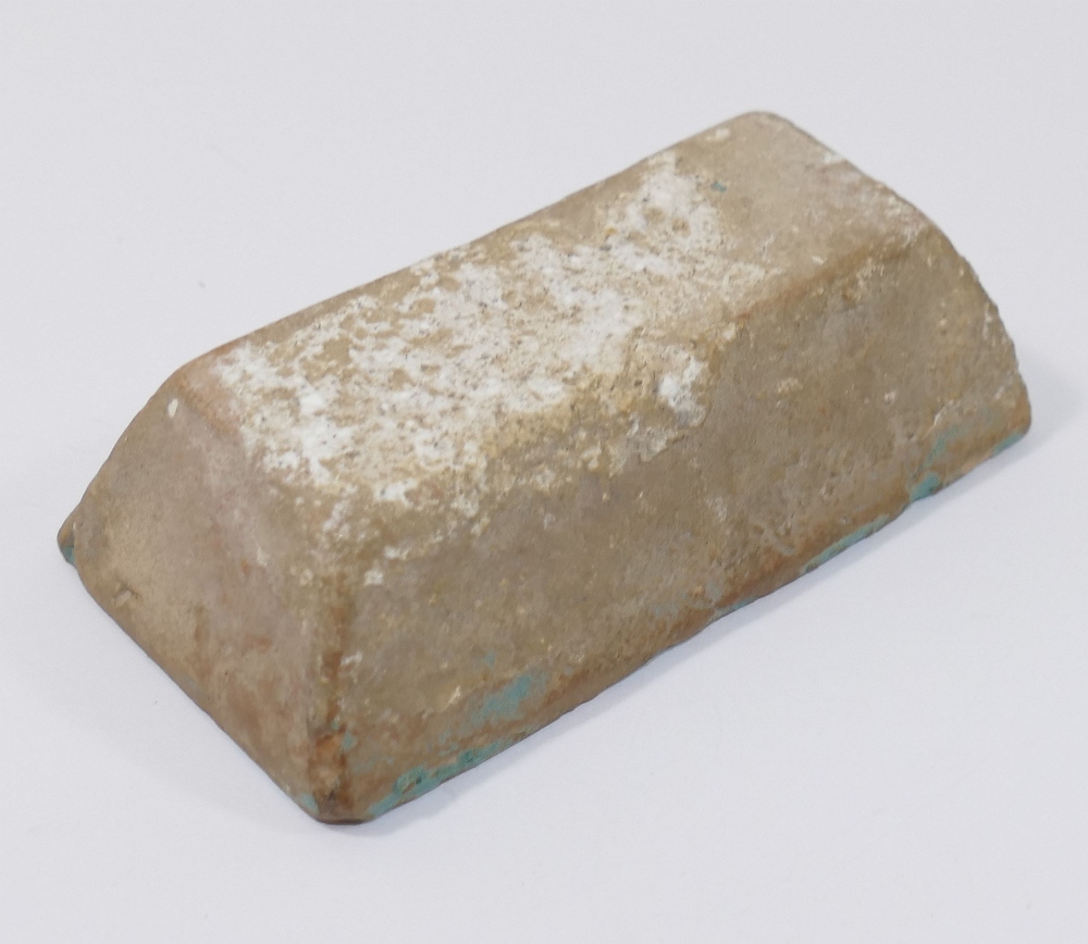 A small rectangular turquoise glazed pottery tile, possibly 12th century Kashan, Iran, 9.2cm x 4.7cm - Image 2 of 2