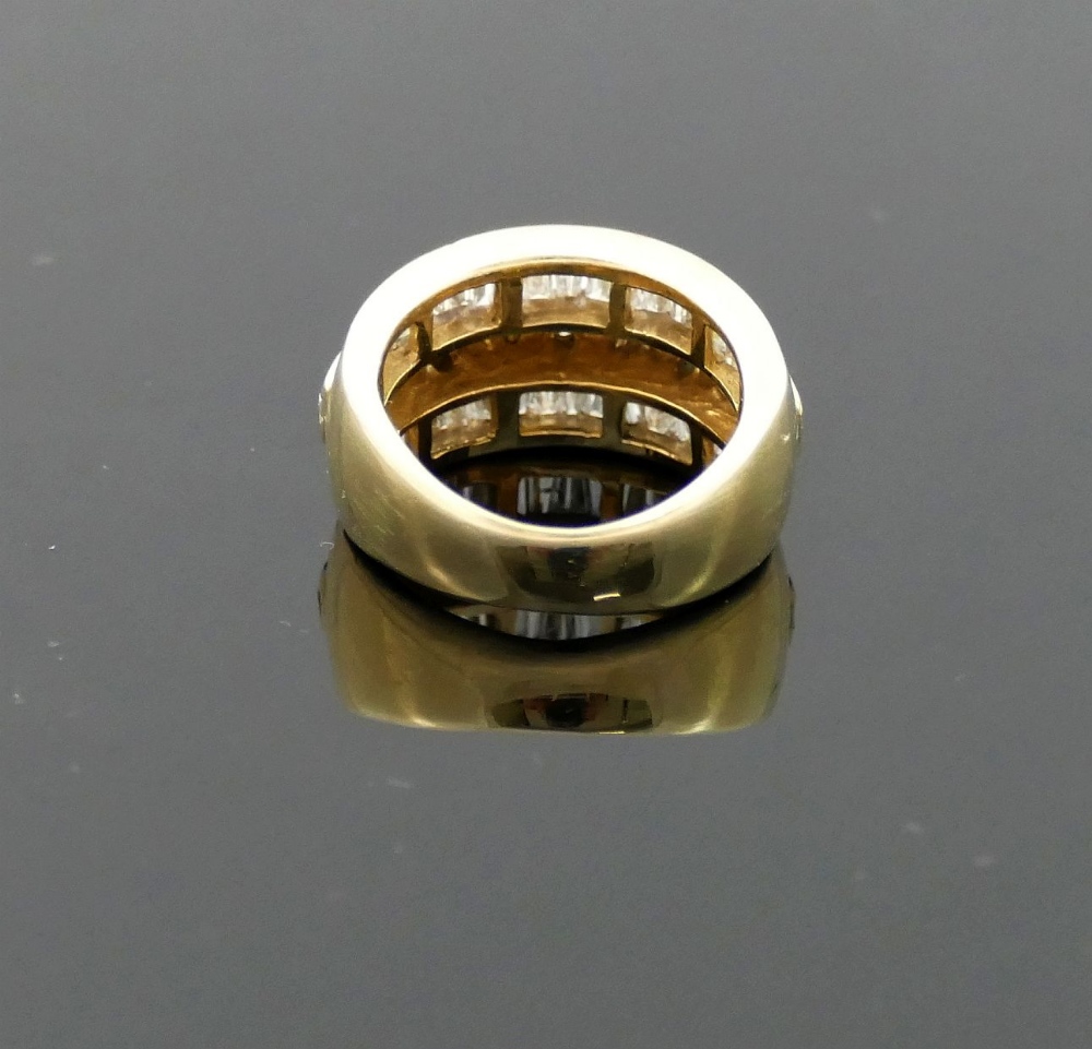A 14 carat gold diamond set triple band ring, London 2000, maker's mark 'TJ', the outer tapered - Image 4 of 5