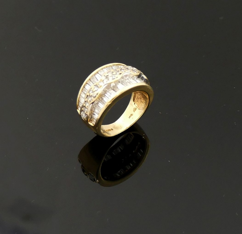 A 14 carat gold diamond set triple band ring, London 2000, maker's mark 'TJ', the outer tapered - Image 2 of 5