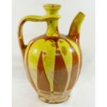 A Turkish Canakkale pottery brown glazed ewer, 32cm high, and another Turkish pottery yellow and