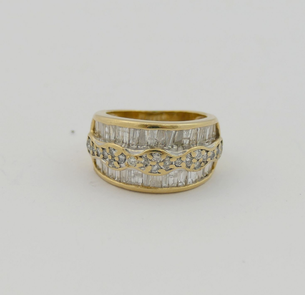 A 14 carat gold diamond set triple band ring, London 2000, maker's mark 'TJ', the outer tapered - Image 5 of 5
