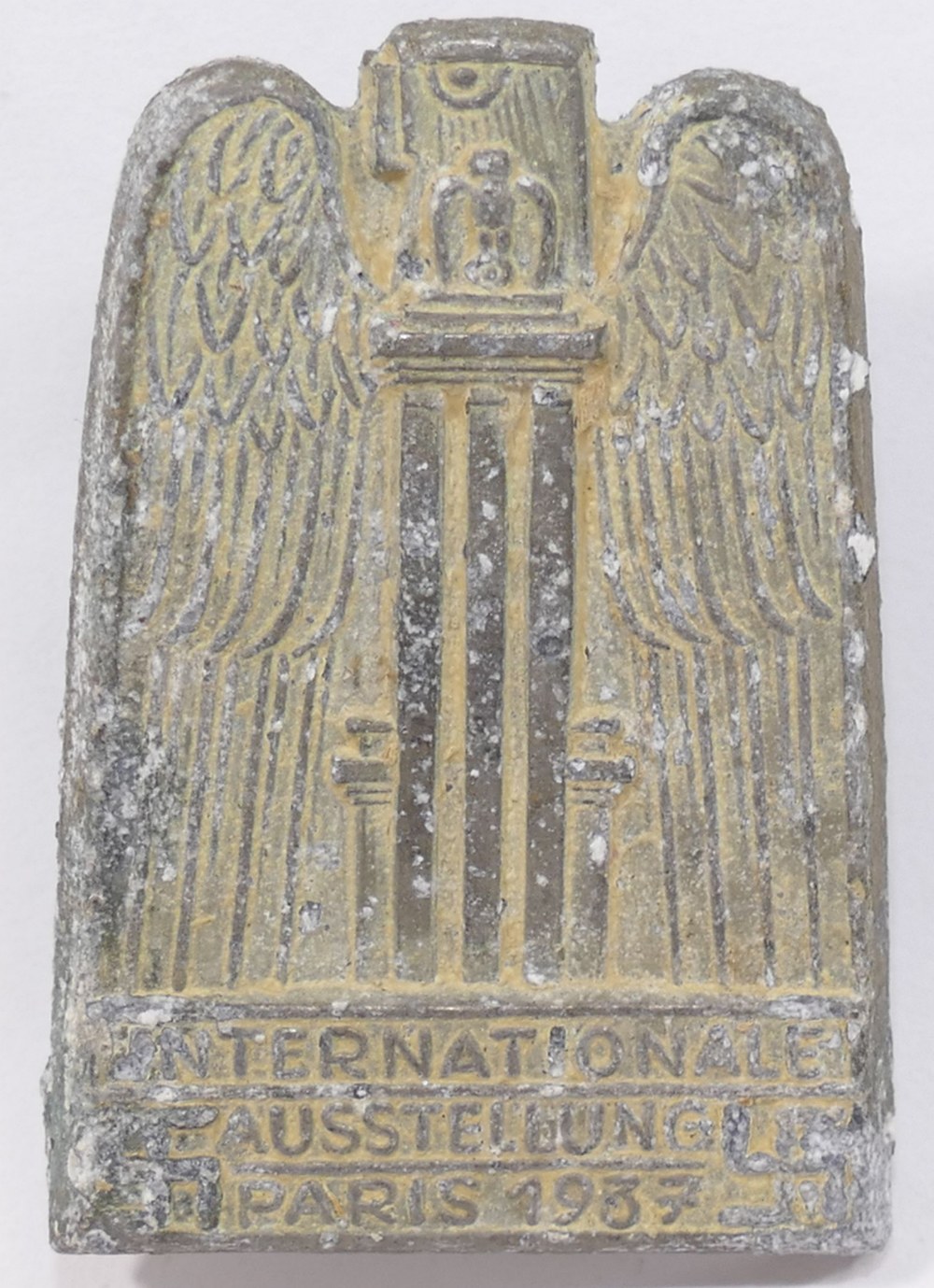 A cast aluminium 1937 Paris International Exposition of Art and Technology in Modern Life badge