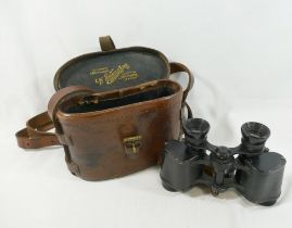 A pair of small military issue field binoculars, inscribed 'No. 2.5', to the shoulder, 10cm high,