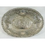 A 19th century German silver basket, the pierced sides embossed with floral swags and oval