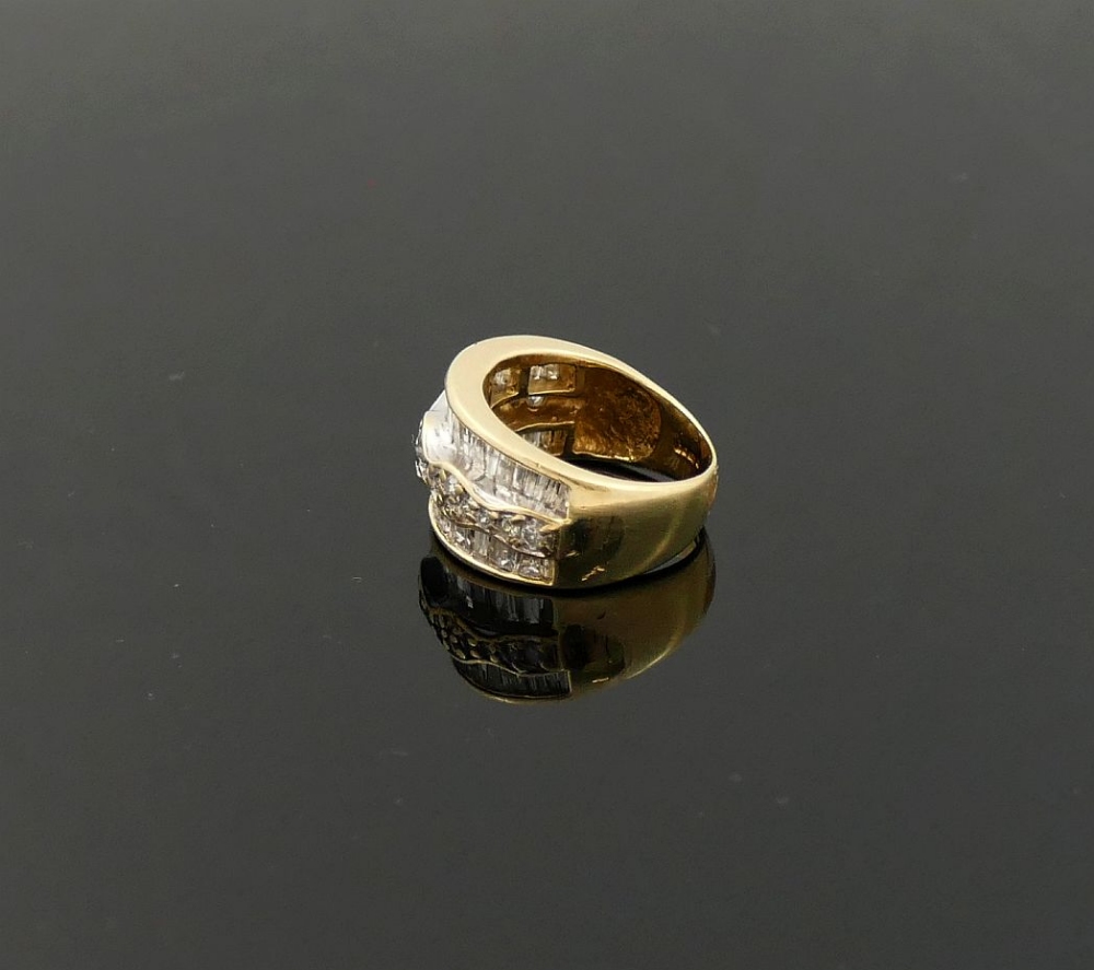 A 14 carat gold diamond set triple band ring, London 2000, maker's mark 'TJ', the outer tapered - Image 3 of 5