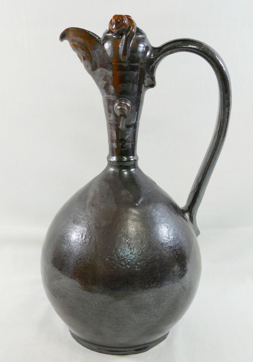 A Turkish Canakkale pottery brown glazed ewer, 32cm high, and another Turkish pottery yellow and - Image 2 of 3