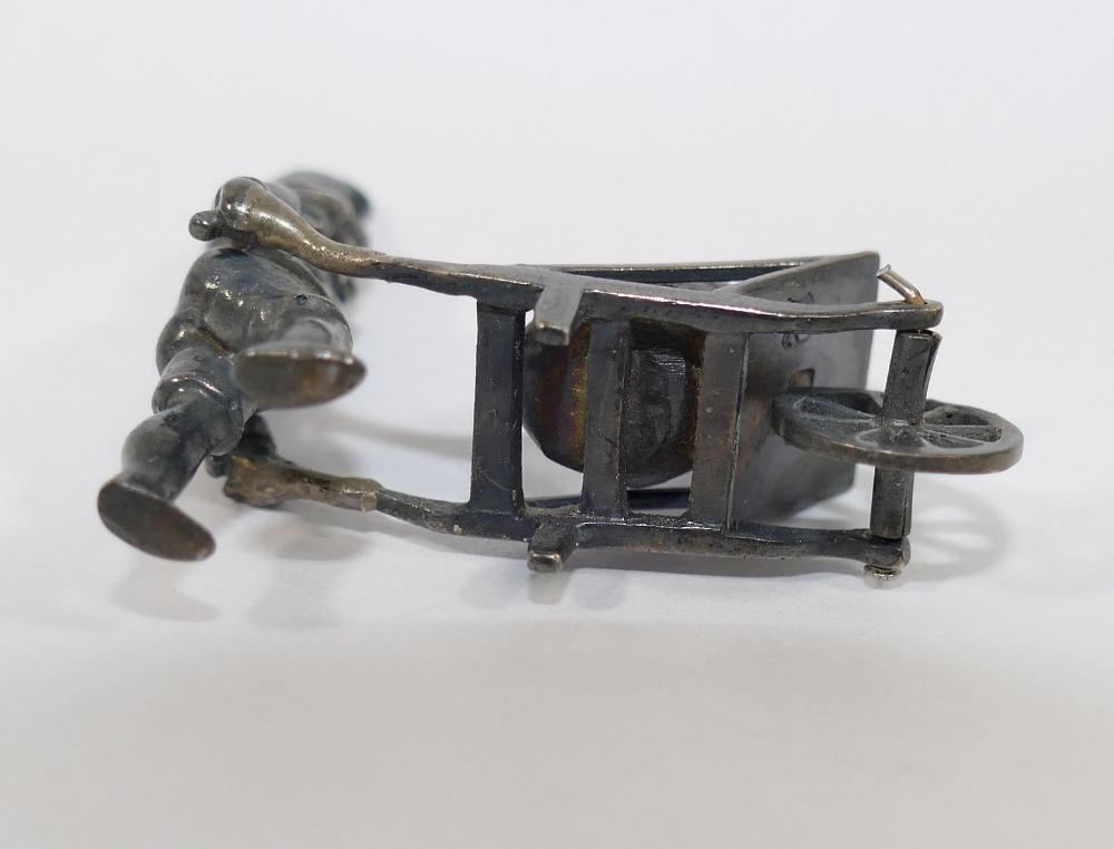 A late 19th century German Neresheimer silver figure of a gnome pushing a wheelbarrow containing a - Image 4 of 4