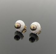 A pair of cultured pearl and diamond stud earrings, the gold/black pearls within diamond set halo