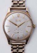 Rolex, a 9ct yellow gold gent's Rolex Precision, manual wind, bracelet stamped 375, letter d and has