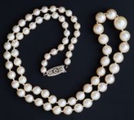 A string of cultured pearls, sizes ranging from 5mm to 10mm, length 20", 9ct white gold diamond