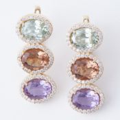 A pair of 14ct yellow gold earrings set with multi-coloured stones that show colour change in