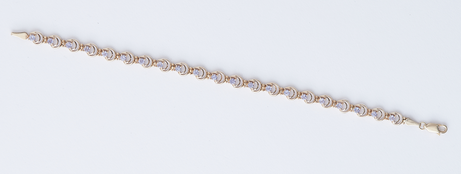 A 9ct yellow gold circular link bracelet set with small round tanzanite, length 18cm, 5.33gm. - Image 2 of 2