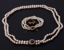 A collection of jewellery to include a double row of 6.5mm pearls strung to a 9ct yellow gold