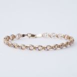 A 9ct yellow gold circular link bracelet set with small round tanzanite, length 18cm, 5.33gm.