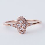 A 9ct rose gold ring set with 0.25 carats of round cut natural pink diamonds, 1.65gm, size R 1/2,
