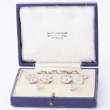 A boxed set of 9ct white gold, diamond & mother pearl cufflinks and dress studs, total weight 9.