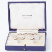 A boxed set of 9ct white gold, diamond & mother pearl cufflinks and dress studs, total weight 9.