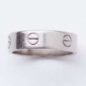 An 18ct white gold Cartier Love wedding band with screw detail, stamped inside 750, L64767 c1996,