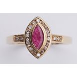 A 9ct yellow gold ring set with a central marquise cut ruby approx. 0.25 carats, surrounded by round