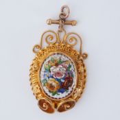 An antique ornate Etruscan style pendant with a mini-mosaic of flowers, in cannetille yellow metal