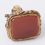 An antique fob seal (not hallmarked or tested) set with carnelian stone, 16.94gm.