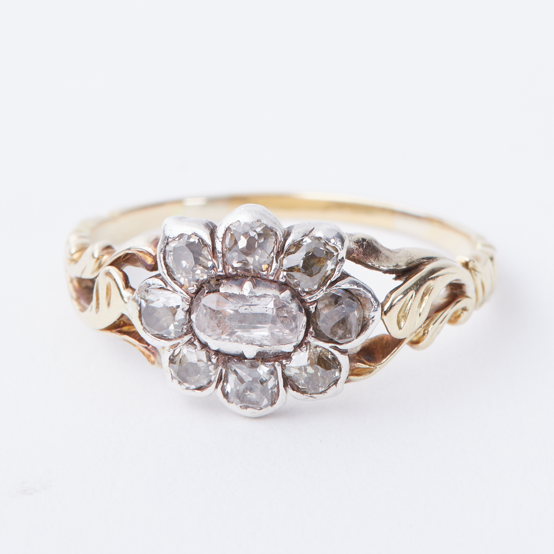 A Georgian flower design ring with ornate shoulders set with a central old cut oval shaped - Image 2 of 2
