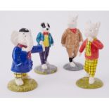 A set of four Beswick Rupert Bear figurines comprising Rupert Bear, Edward Trunk, Bill Badger and