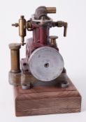 Sirius twin cylinder steam engine on wooden plinth, 8" high.