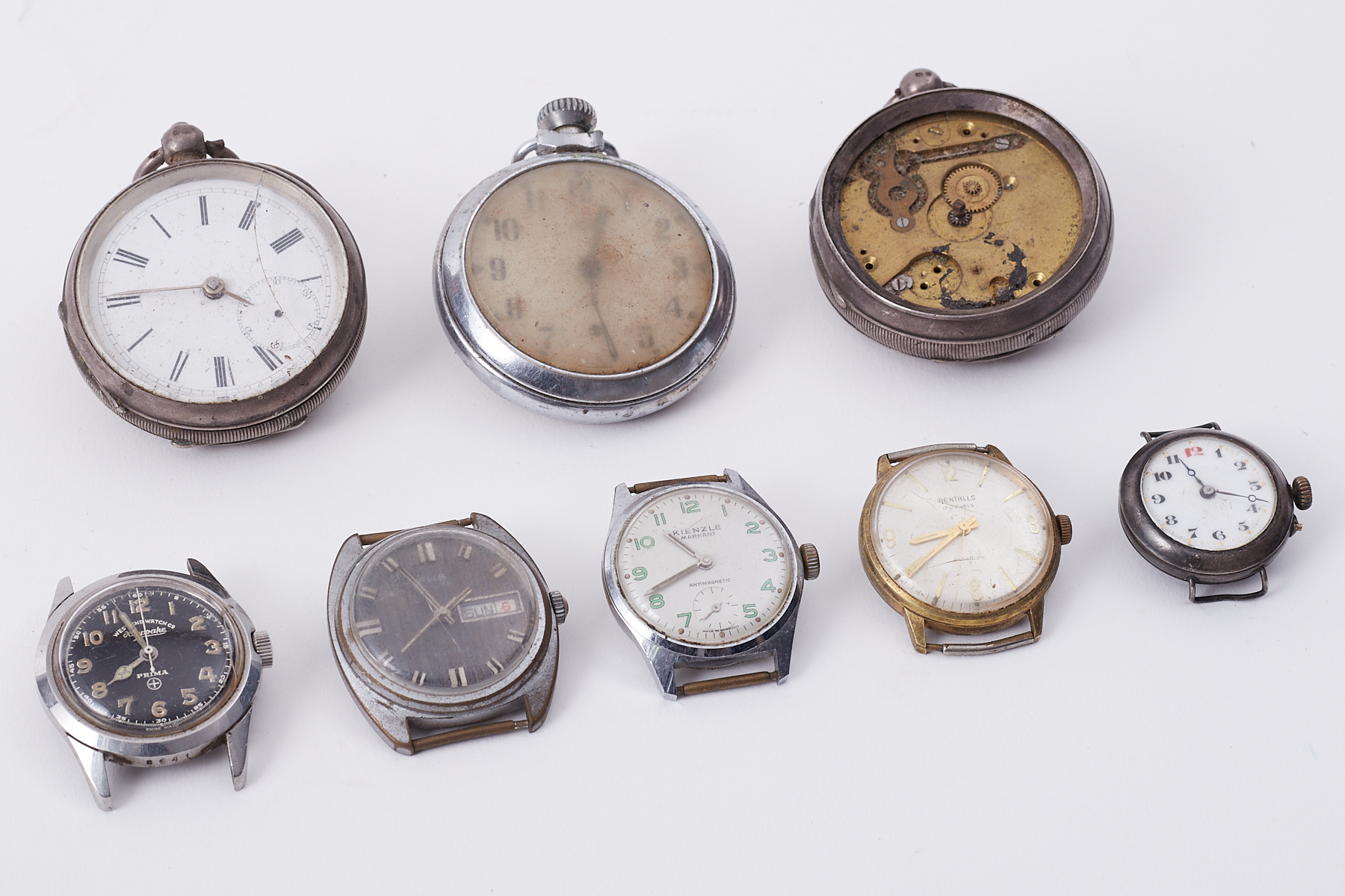 Mixed collection of pocket and wristwatches in worn condition to include West End Watch Company