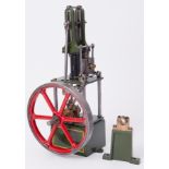 A Stuart James Coombes vertical steam engine, 14" high.