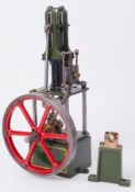 A Stuart James Coombes vertical steam engine, 14" high.