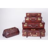 Six Vintage leather suitcases some with travel labels, one with maker label 'Kelvin' brand.