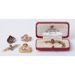 A collection of Fleet Air Arm brooches to include four in 9ct gold, (one boxed), total weight 14.