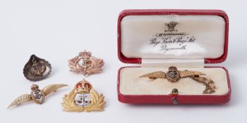A collection of Fleet Air Arm brooches to include four in 9ct gold, (one boxed), total weight 14.