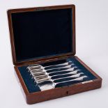 A Walker & Hall set of six silver desert spoons, approx 10.76oz, cased.