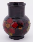 A Moorcroft Flambe Clematis vase, height 13cm.