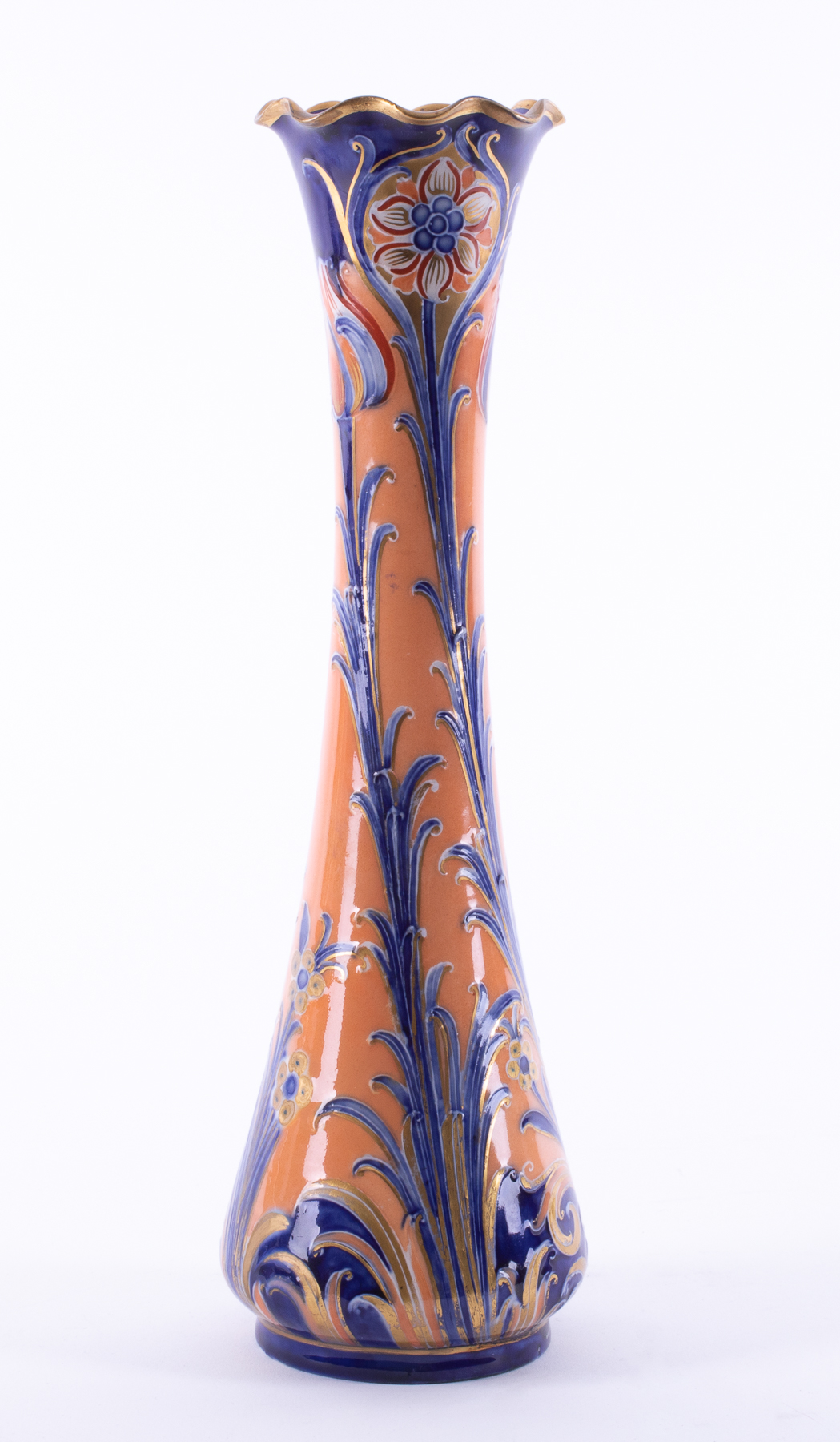 A William Moorcroft Macintyre vase, decorated with orange and blue flowers, circa 1903,