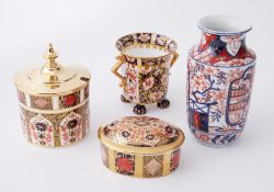 Royal Crown Derby a small box and cover, sugar pot with lid, twin handle cup and small Imari vase (