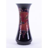 A William Moorcroft Burslem vase decorated with Pomegranate, also decorated on the inside, circa