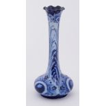 A William Moorcroft Florian Ware 'Peacock' tall stemmed vase circa 1902, height 17cm.