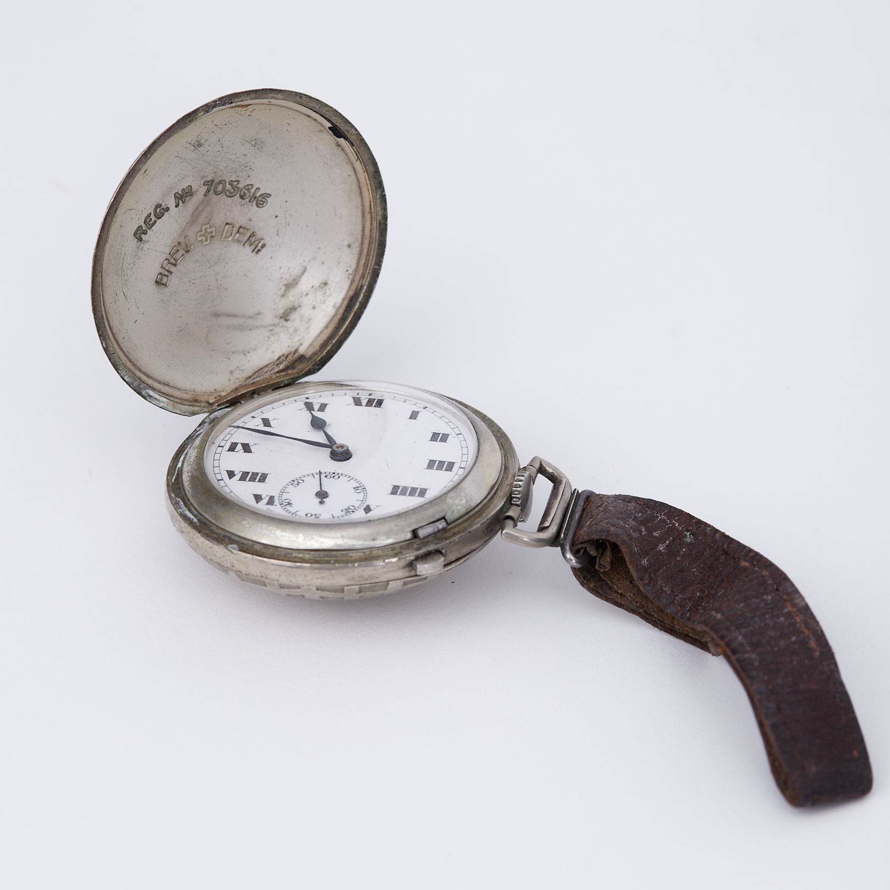 An enclosed face French pocket watch, inscribed 'Brev Demi'