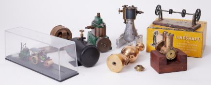 An assortment of various model steam engines, brass valve,