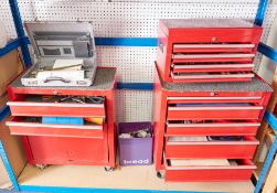 Two tool cabinets on wheels and one top box tool cabinet each containing a collection of various
